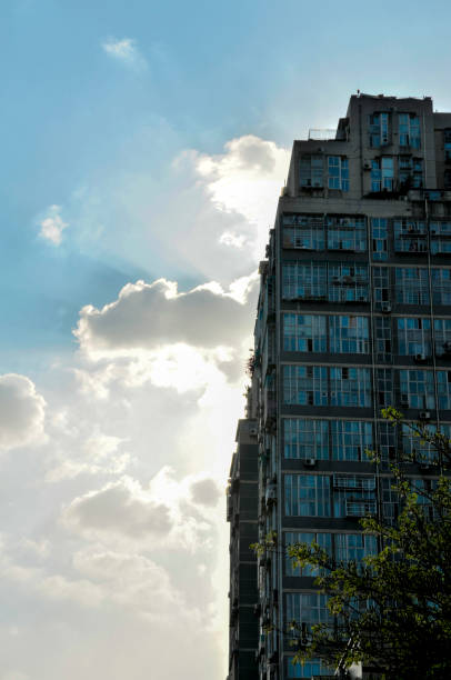 istock Residential building with cloud in sunrise 1151800702