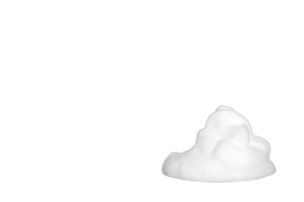 istock White foam bubbles, beauty smooth mousse, close up photo. 1151801884