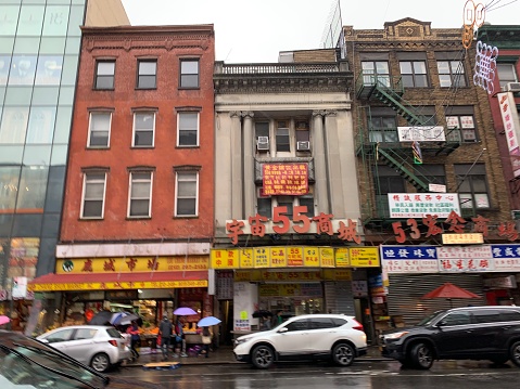 New York- 12 May 2019- chinatown shopping mall exterior view, manhattan chinatown is home to the highest concentration of Chinese people in the Western Hemisphere.