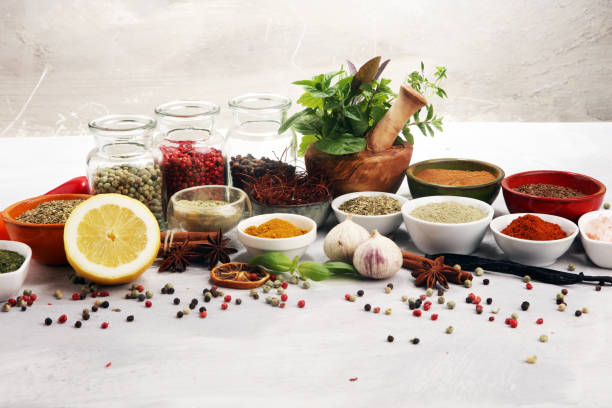 istock Spices and herbs on table. Food and cuisine ingredients with basil 1151807680