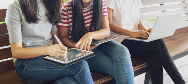 Back to school education knowledge college university concept, Young people being used computer and tablet, Education and technology concept.