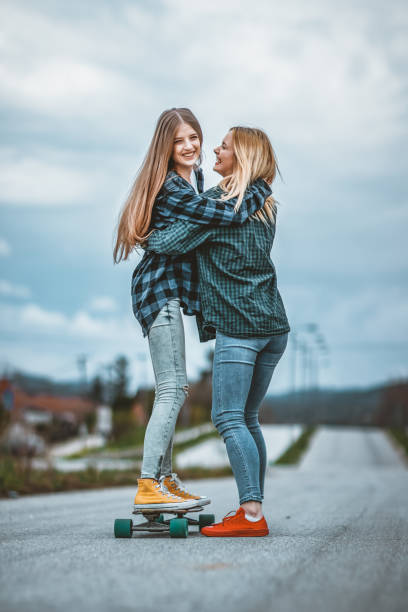 istock Women Learning to use a Skateboard 1151811606