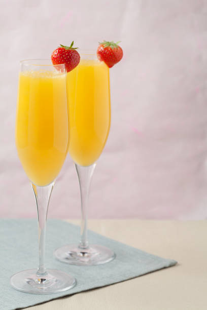 istock Mimosa cocktail and strawberries 1151812982
