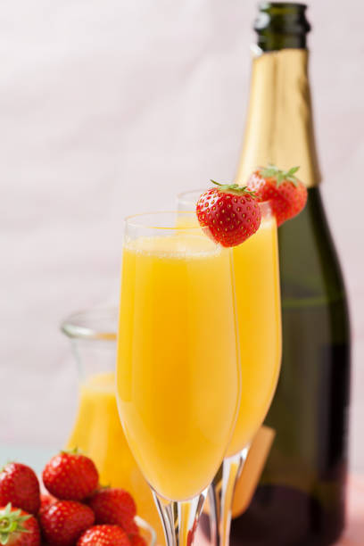 istock Mimosa cocktail and strawberries 1151814408
