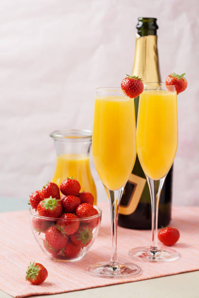 istock Mimosa cocktail and strawberries 1151814482
