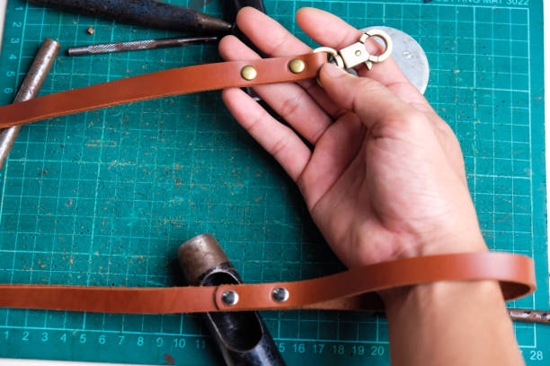 istock Leather dog leash craftsmanship object with metal ring 1151814613