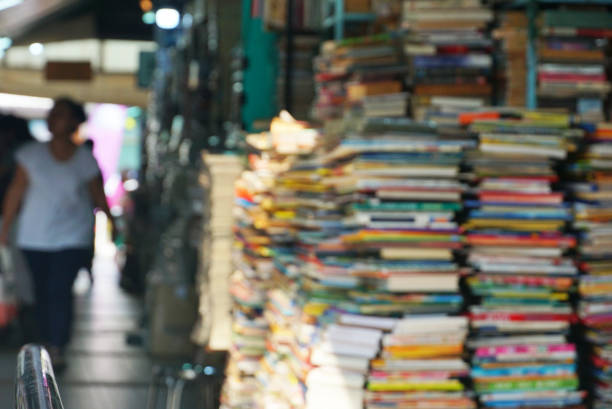 istock Blur books stack in secondhand books shop at Jatujak market. 1151815329