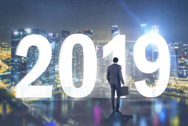 istock Businessman with briefcase looking at city 2019 1151815574