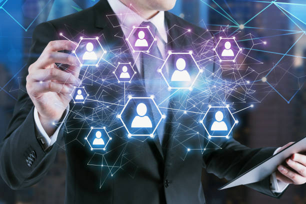 istock Man working with social media icons 1151815814