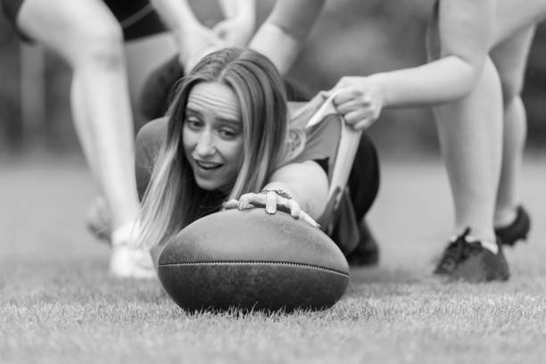 istock Girl playing rugby together outside in summer 1151817367