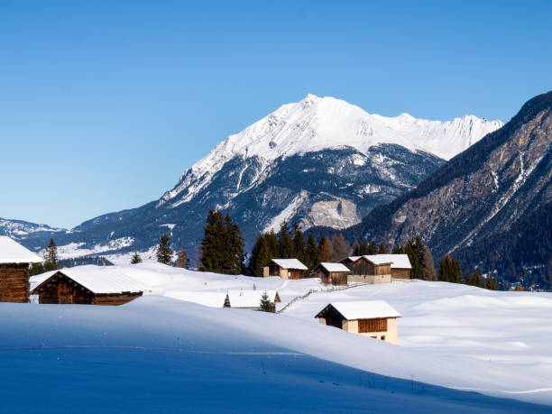 Savognin: region, snow-covered mountains and ski slopes