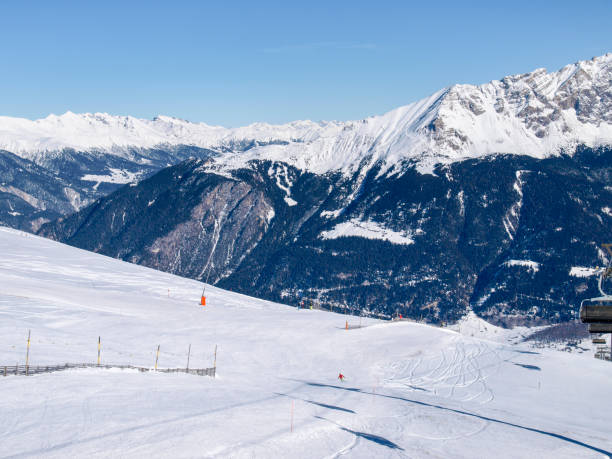 istock Savognin: region, snow-covered mountains and ski slopes 1151820099