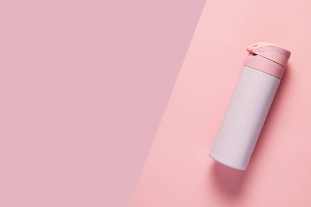 istock Pink thermos on pink background 1151822047
