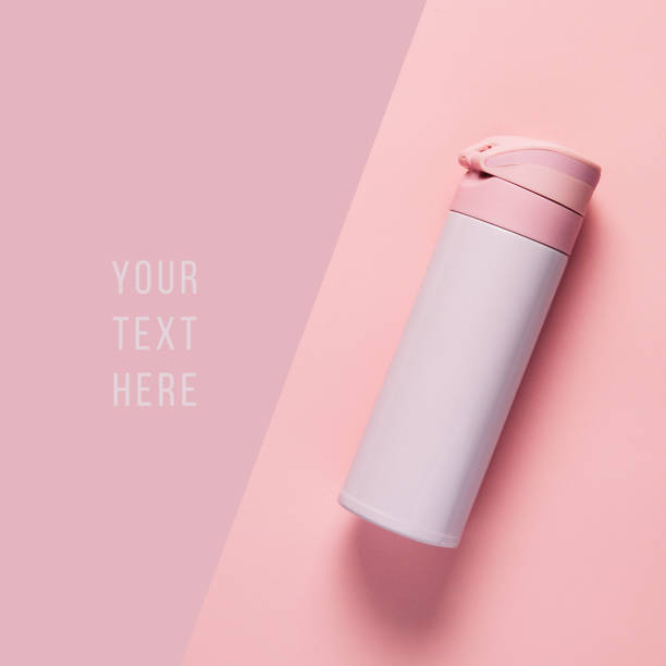 istock Pink thermos on pink background 1151822053