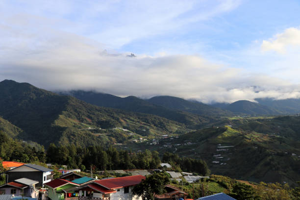 istock Mount Kinabalu with clouds - Borneo Malaysia Asia 1151822579