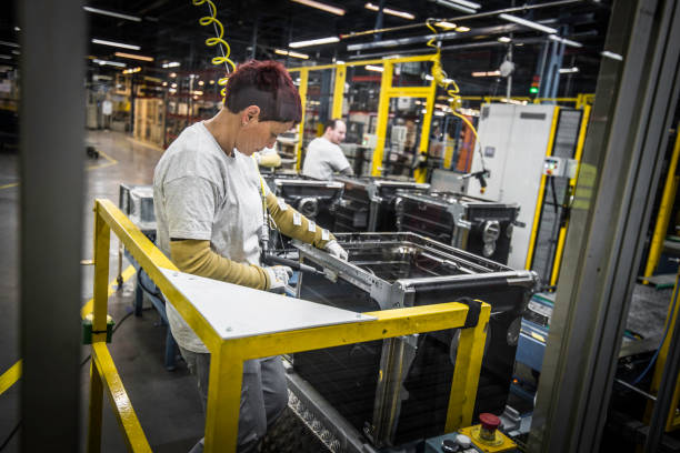 istock Woman constructing a metal frame for a washing machine 1151823336