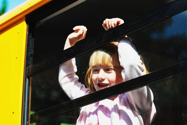 istock Girl on School Bus 1151823872