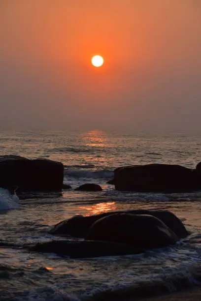 Photo of Chennai, Tamilnadu, India: Febrauary 15, 2019 - Sunrise at Kovalam Beach in Chennai