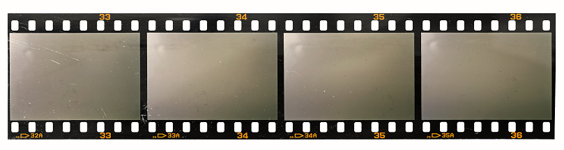 3d rendering of a single film strip arranged in turns and bends on white background. Media and art. Movies and films. Retro technologies.