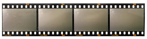 long 35mm film or movie strip with 4 empty frames or cells on white background, just blend in your photos to make them look vintage long 35mm film strip isolated 35mm movie camera stock pictures, royalty-free photos & images