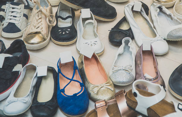 istock Big collection of different kids shoes. 1151829500