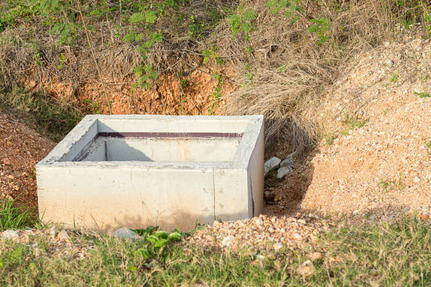 istock Concrete construction tube pipe. Building a road sewer drain system. Sewer construction. 1151830692
