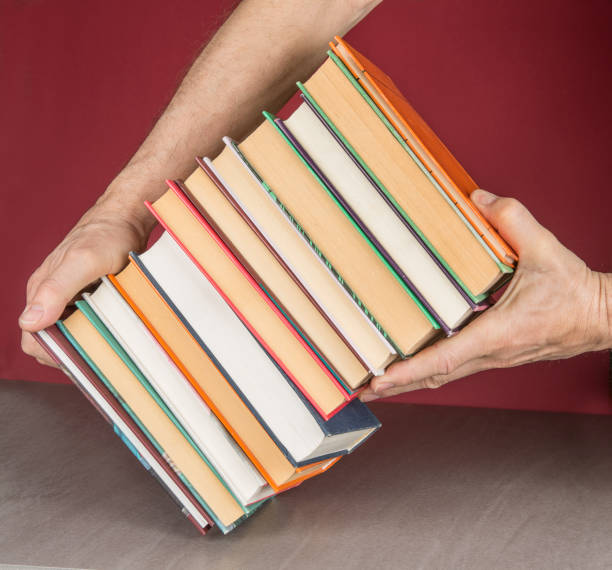 istock Stack of colorful books. Education and entertainment concept 1151830934