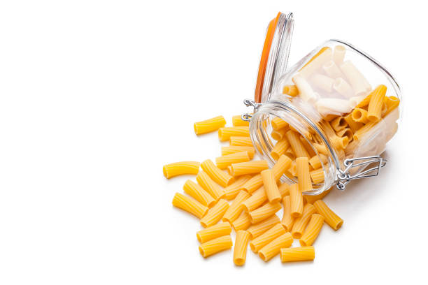 istock Raw rigatoni isolated on white background 1151831807