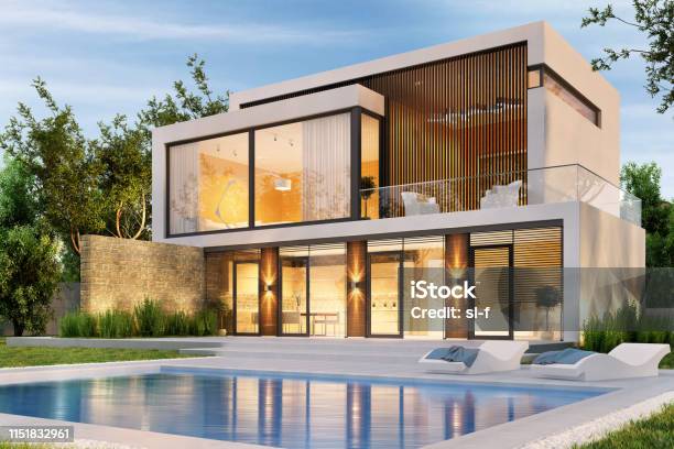Evening View Of A Modern Large House With Swimming Pool Stock Photo - Download Image Now