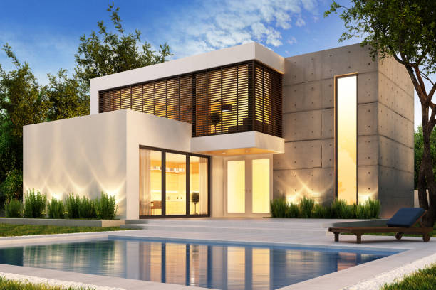 Evening view of a modern house with swimming pool Evening view of a modern house with pool construction site home stock pictures, royalty-free photos & images