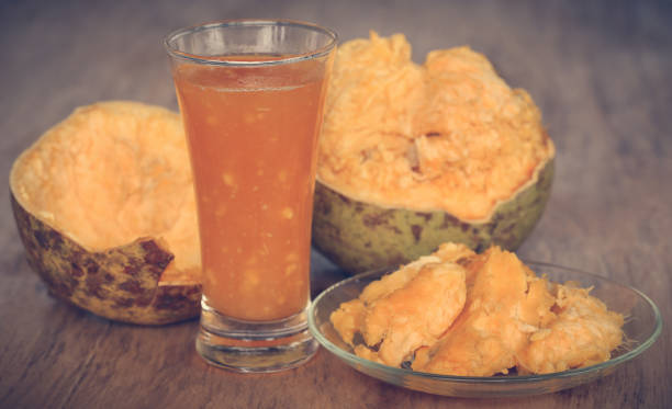istock Medicinal Bael fruit with juice in a glass 1151835677