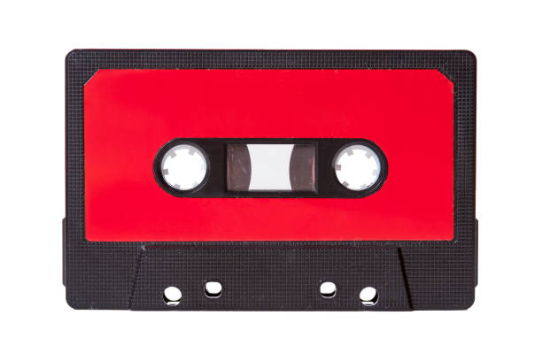 istock Red blank vintage cassette tape with an empty label isolated on white background, old retro audio equipment concept. Copy space, text space. 1151837031
