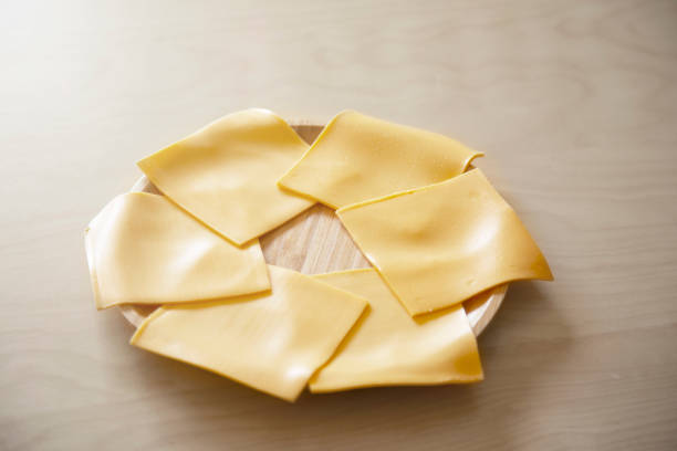 American Cheese American Cheese colby cheddar stock pictures, royalty-free photos & images