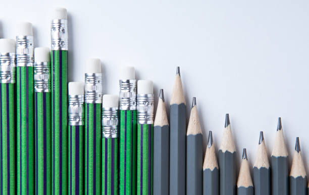 istock many simple pencils with erasers in a row on a white table  top view 1151837793