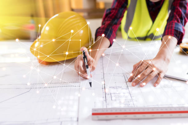 istock Professional safety engineer , young Asian female  working at her office   . Concept for construction safety . 1151838741