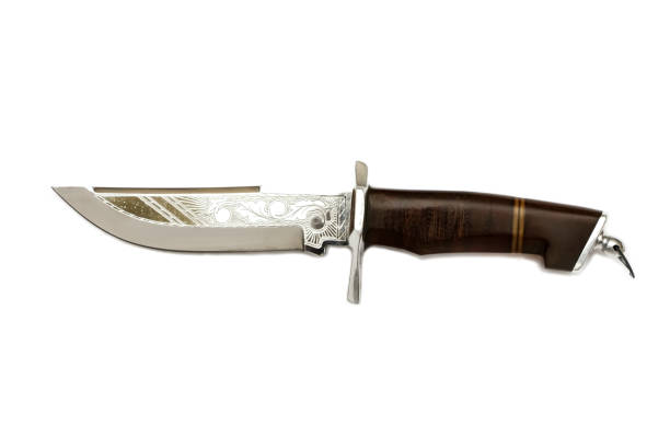 istock Hunting dagger knife with decorative shell isolated on a white background. Vintage dagger on white background. Dagger mockup on white.Curved ceremonial dagger knife with a decorative. 1151840109