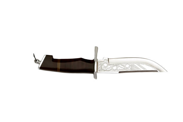 istock Hunting dagger knife with decorative shell isolated on a white background. Vintage dagger on white background. Dagger mockup on white.Curved ceremonial dagger knife with a decorative. 1151840110