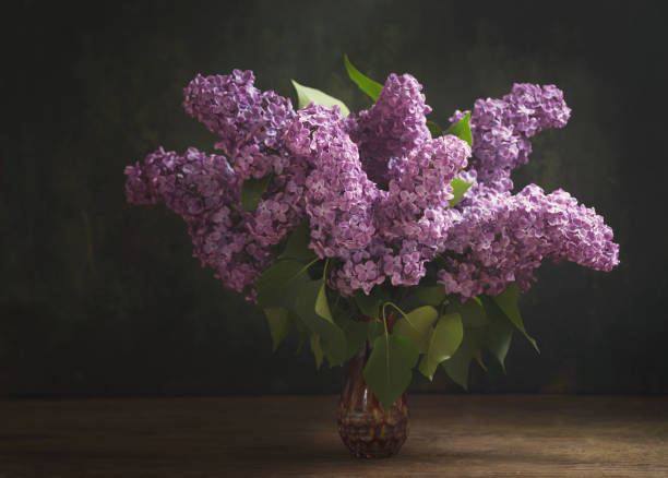 istock still life with blooming branches of lilac flowers 1151841053
