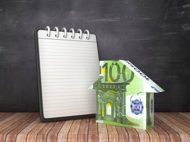 istock Note Pad with Puzzle Euro House on Chalkboard Background - 3D Rendering 1151843716