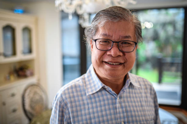 istock Happy Senior Taiwanese Man at Home 1151845391