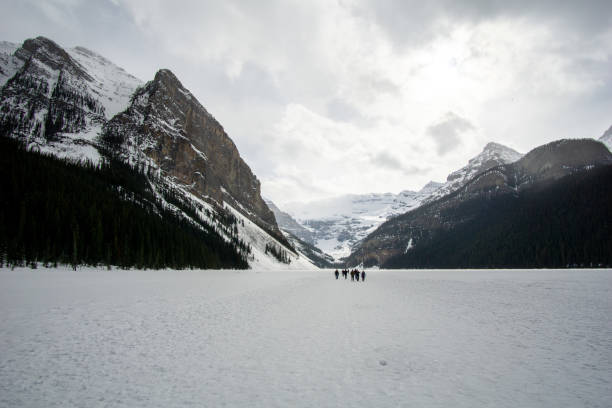 istock People Walking on Frozen Lake Louise 1151845436