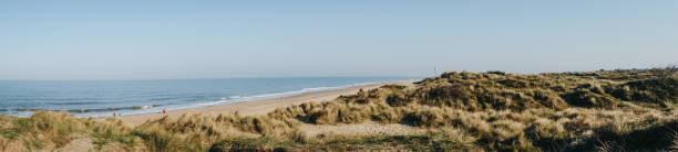 istock Panoramic view from the hill over Hemsby beach, Norfolk, UK. 1151848336