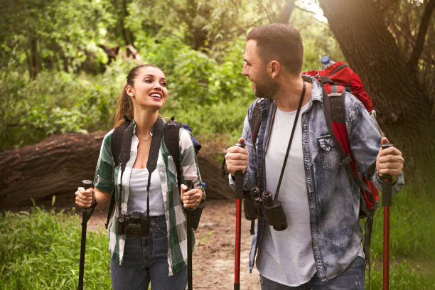 istock Young couple hiking in nature 1151849352