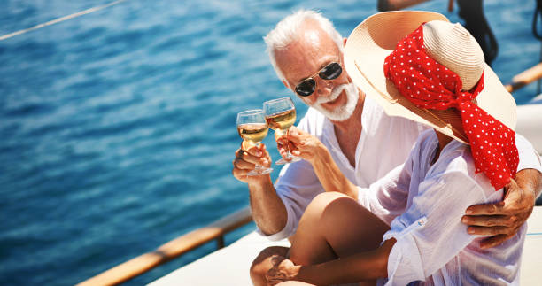 istock Senior couple on a sailing cruise. 1151849568