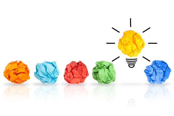 istock Idea Concepts Light Bulb Crumpled Paper on White Background 1151850145
