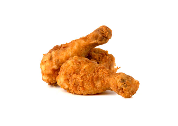 istock Fried legs on a white background. Chicken legs deep fried close-up. 1151850616