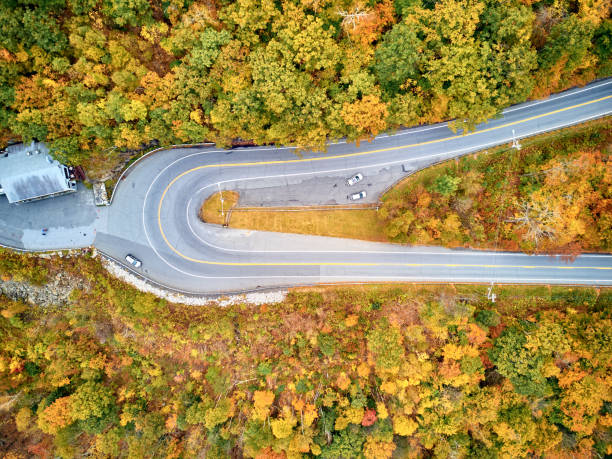 istock Scenic highway hairpin turn in autumn 1151851879