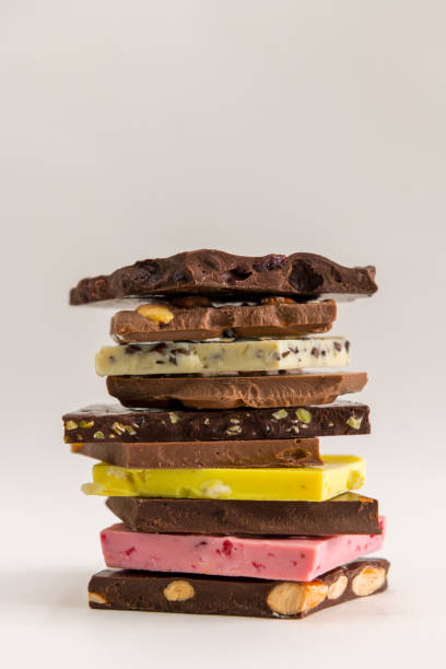 istock Various pieces of chocolate stacked to a tower. 1151852231