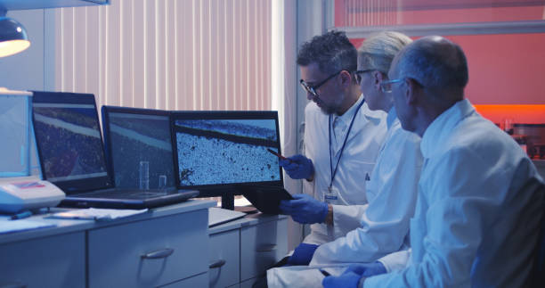 istock Scientists watching monitor and analyzing 1151860836