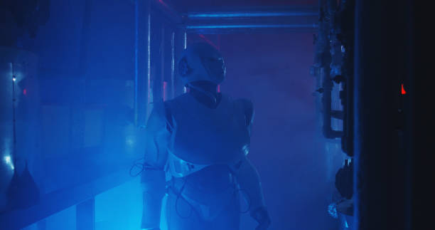 istock Humanoid robot working in a smoke filled lab 1151860945